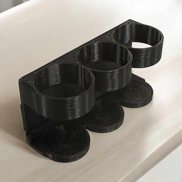 Triple Thumb Tip Holder by Quique Marduk