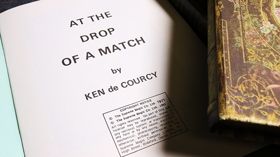At the Drop of a Match by Ken De Courcy