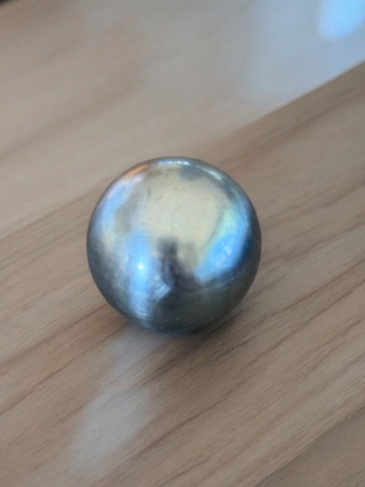 Steel Ball Through Glass